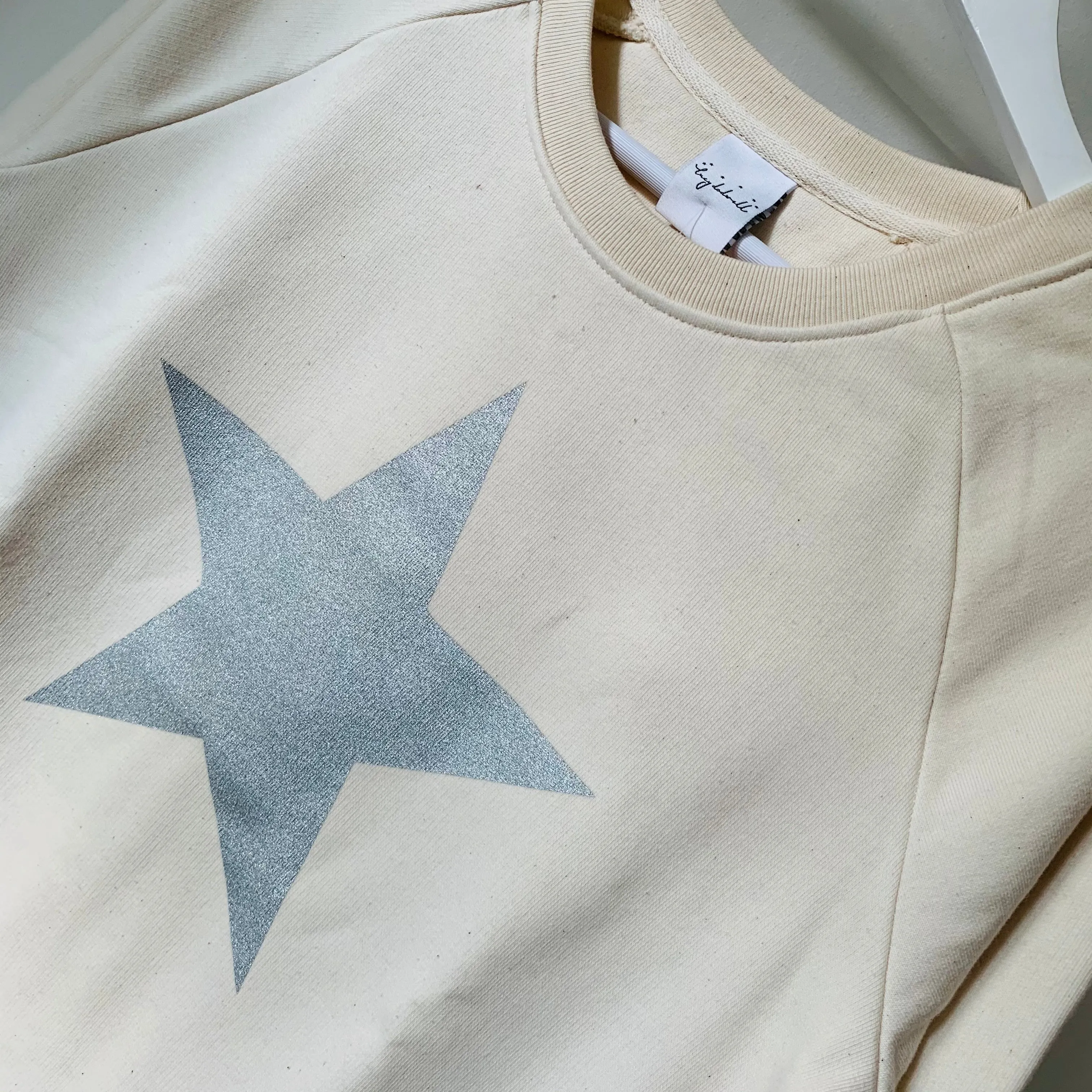 Glittery grey star cream raw sweatshirt