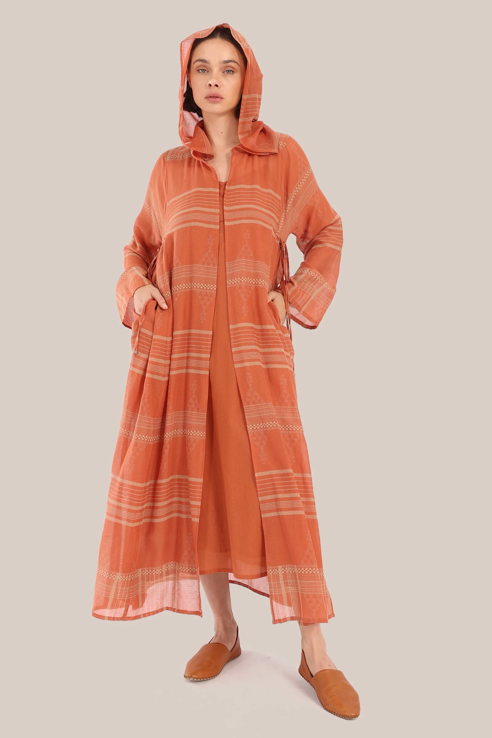 Long hooded coat in printed cotton