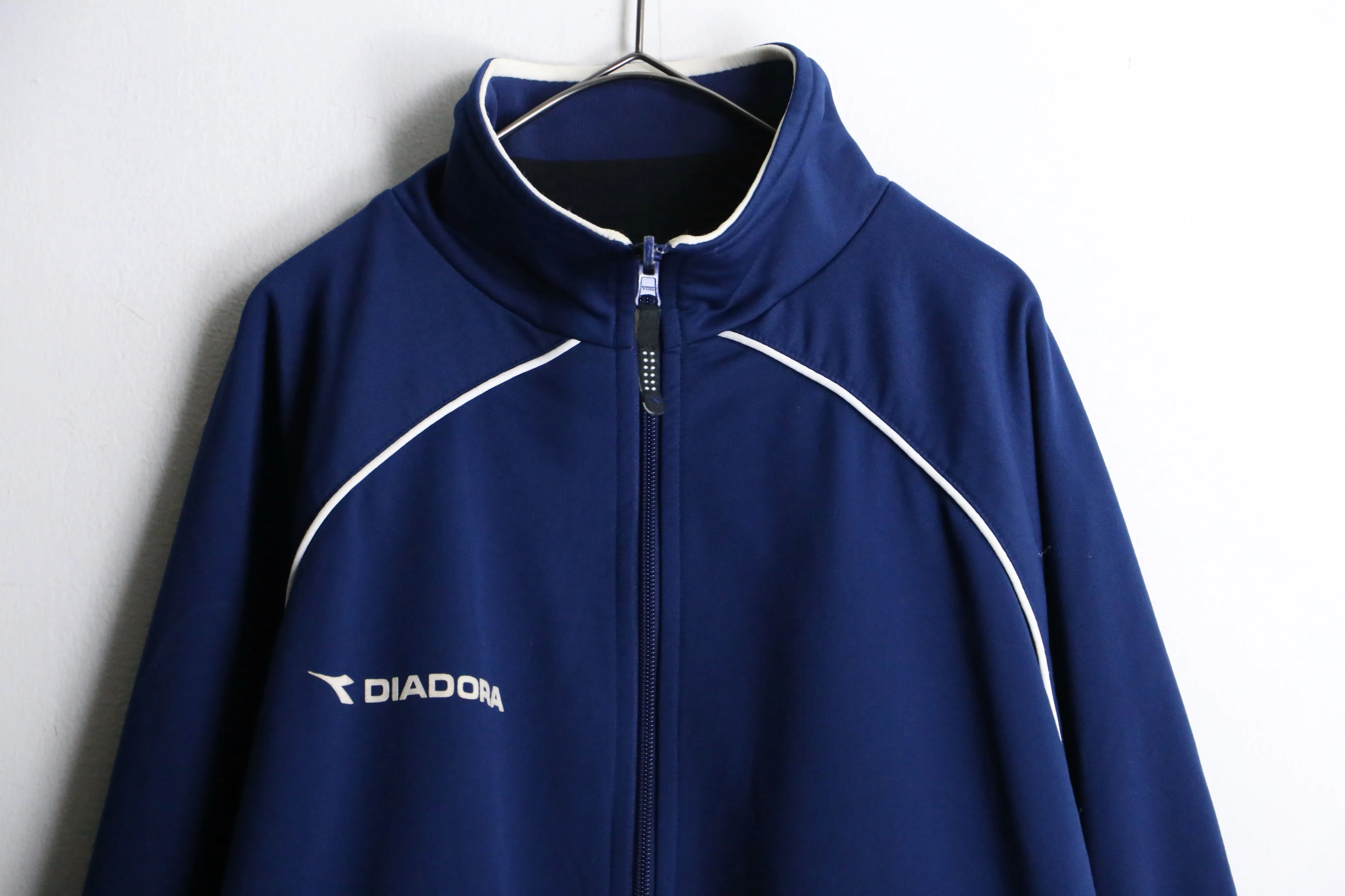 "DIADORA" blue × black reversible track jacket